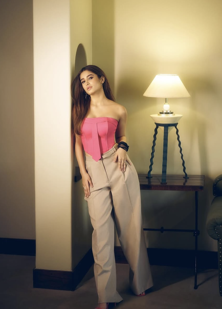 RASHA IN BELTED FLARE TROUSERS